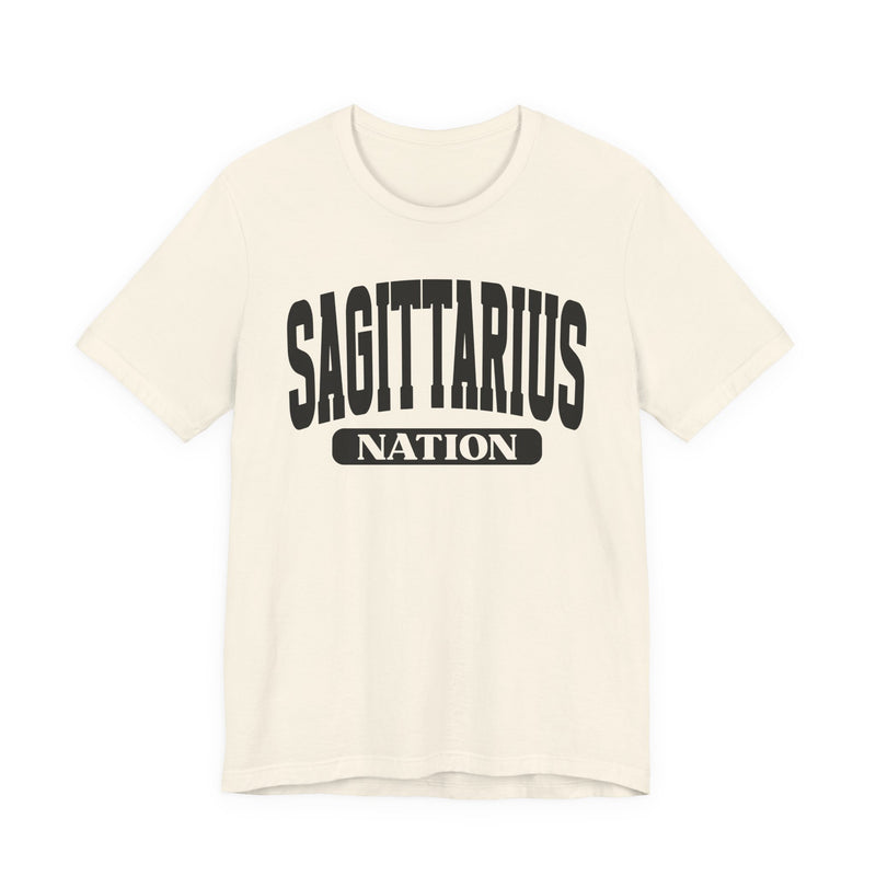 Natural t-shirt with black arched SAGITTARIUS collegiate lettering and NATION banner print, front flat-lay view.