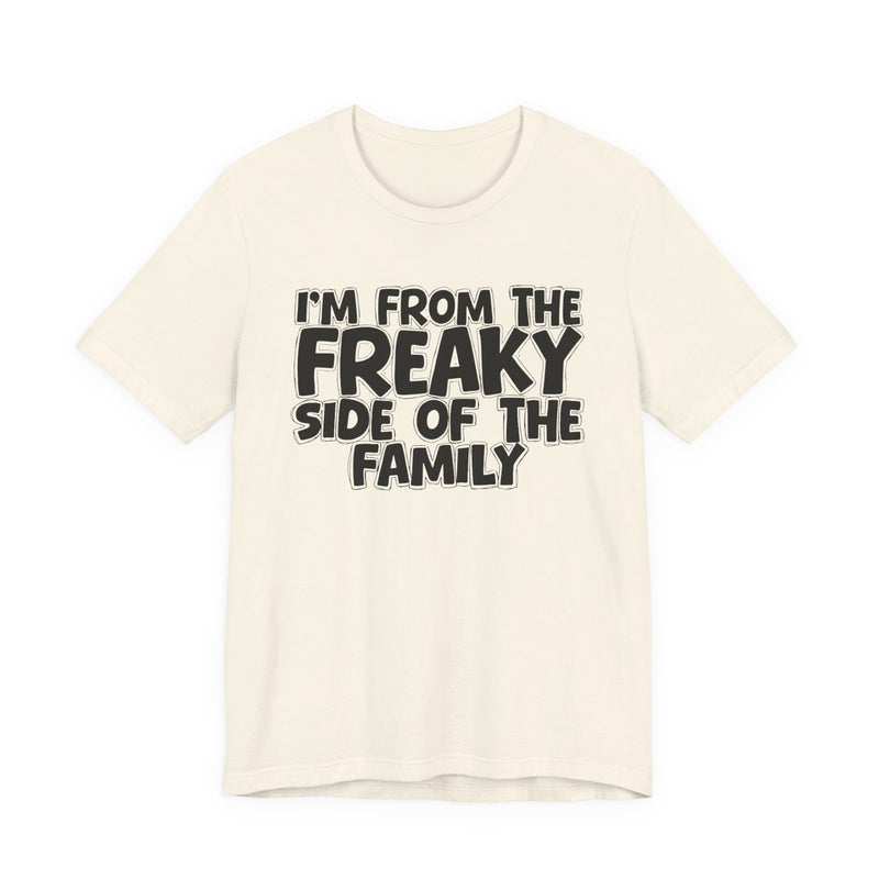 Natural t-shirt with the "I'M FROM THE FREAKY SIDE OF THE FAMILY" statement design in white outlined block lettering, front flat-lay view.