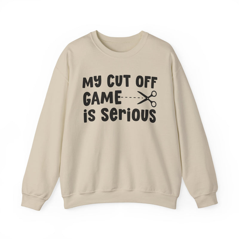 Sand sweatshirt with black bold block lettering reading MY CUTOFF GAME IS SERIOUS, front flat-lay view.