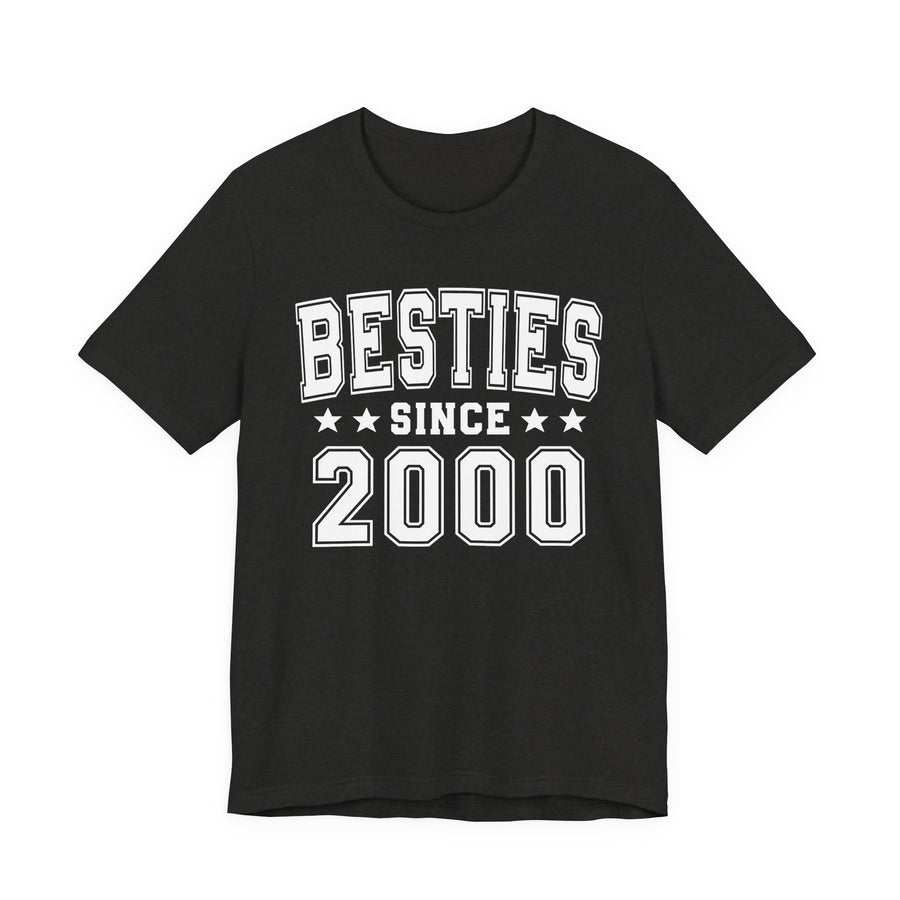 Black t-shirt with cream collegiate lettering reading BESTIES SINCE [YEAR], front flat-lay view.