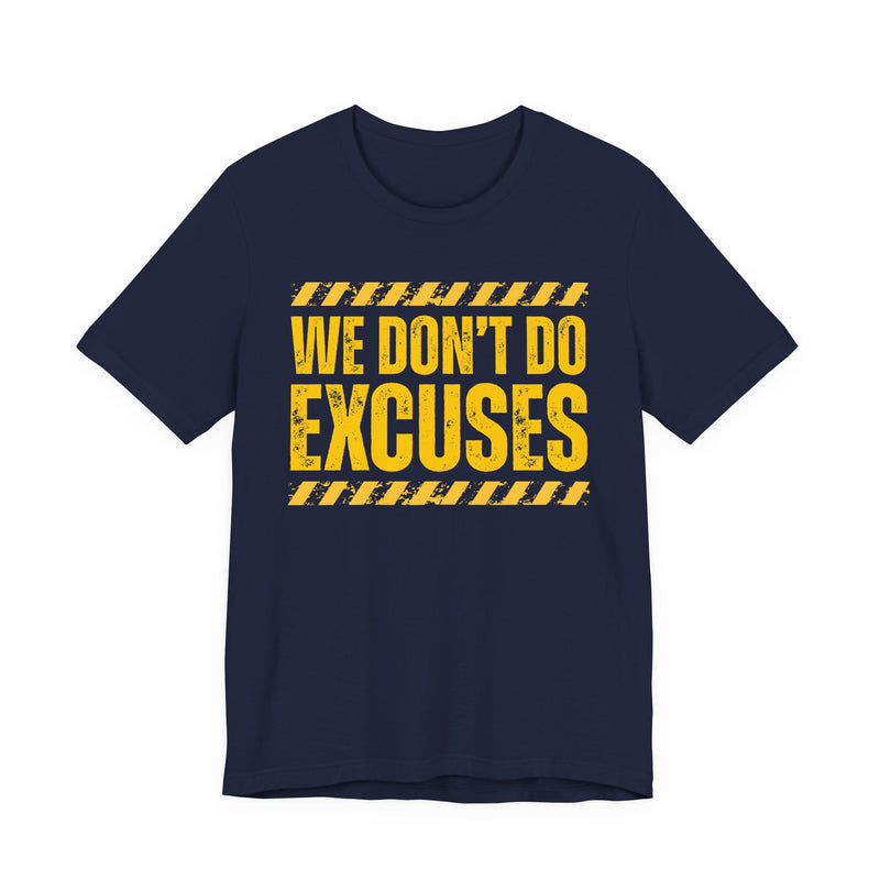 Navy t-shirt with yellow bubble lettering reading WE DON'T DO EXCUSES, front view.