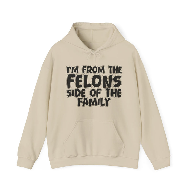 Sand hoodie with drawstring hood and kangaroo pocket with white outlined bubble lettering reading 'I'M FROM THE FELONS SIDE OF THE FAMILY', front flat-lay view.