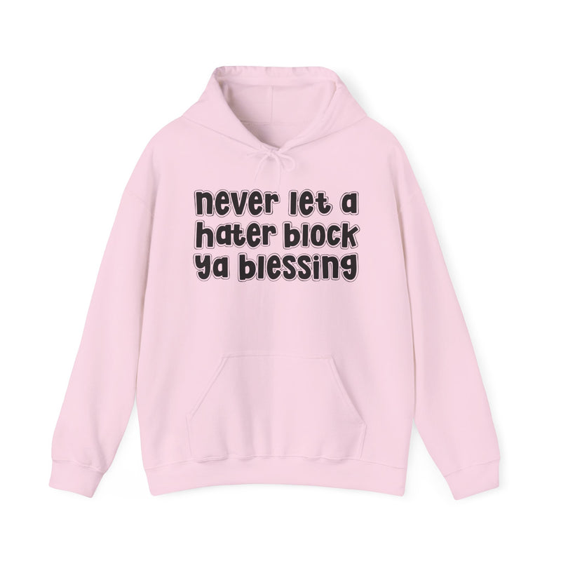 Light Pink hoodie with black outlined bubble lettering reading "never let a hater block ya blessing", front flat-lay view.