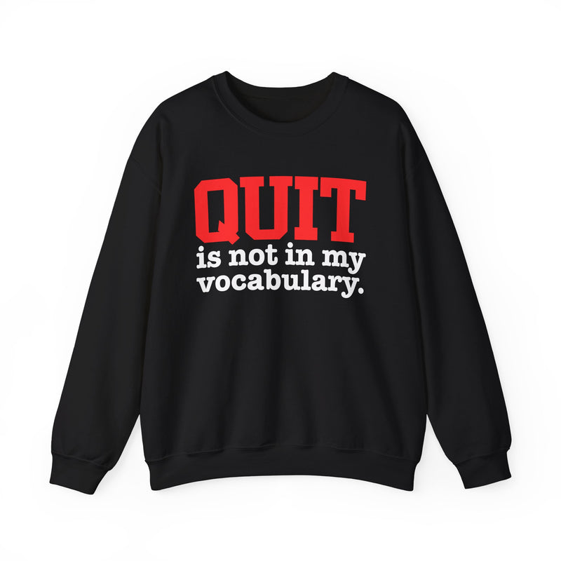Black sweatshirt with white and red block lettering reading "QUIT is not in my vocabulary.", front flat-lay view.