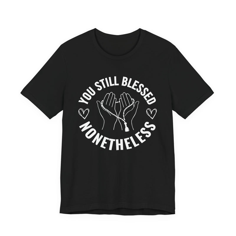 T-Shirt with “YOU STILL BLESSED NONETHELESS” statement print