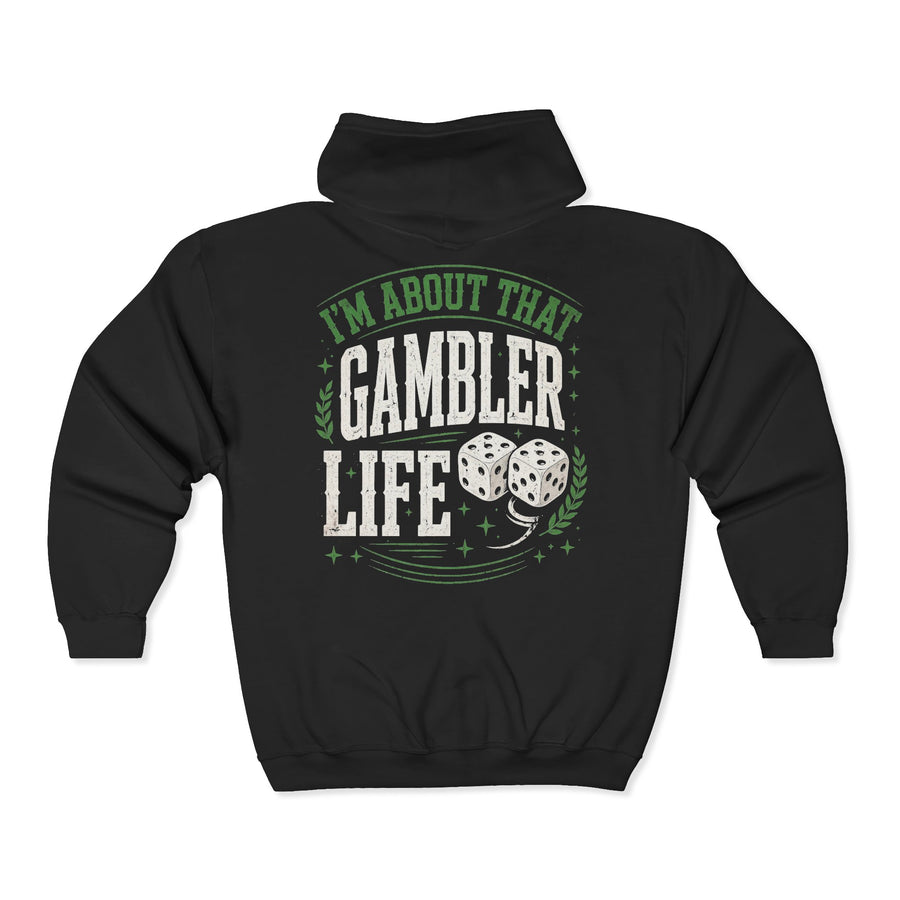 Black zip hoodie with white and green western lettering reading "I'M ABOUT THAT GAMBLER LIFE", back flat-lay view.