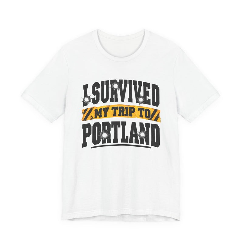 T-Shirt with collegiate lettering reading I SURVIVED MY TRIP TO PORTLAND, front view.