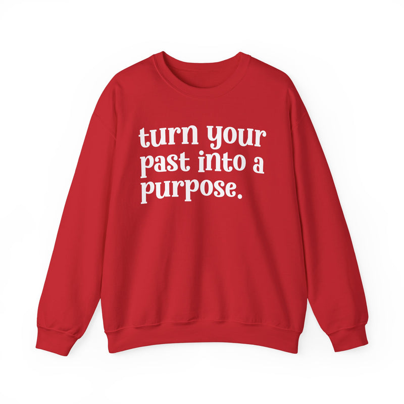 Red sweatshirt with white "turn your past into a purpose." lettering, front view.