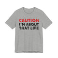 Caution I'm About That Life T-Shirt — Bold Statement Tee