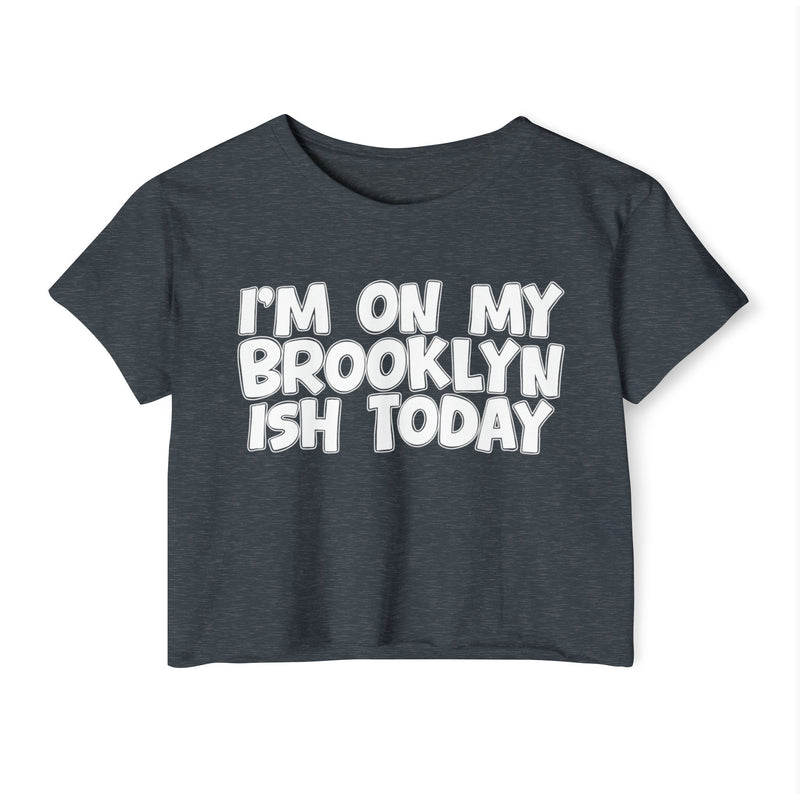 Antique Denim crop top with white hand-lettered "I'M ON MY BROOKLYN ISH TODAY" text, front view.