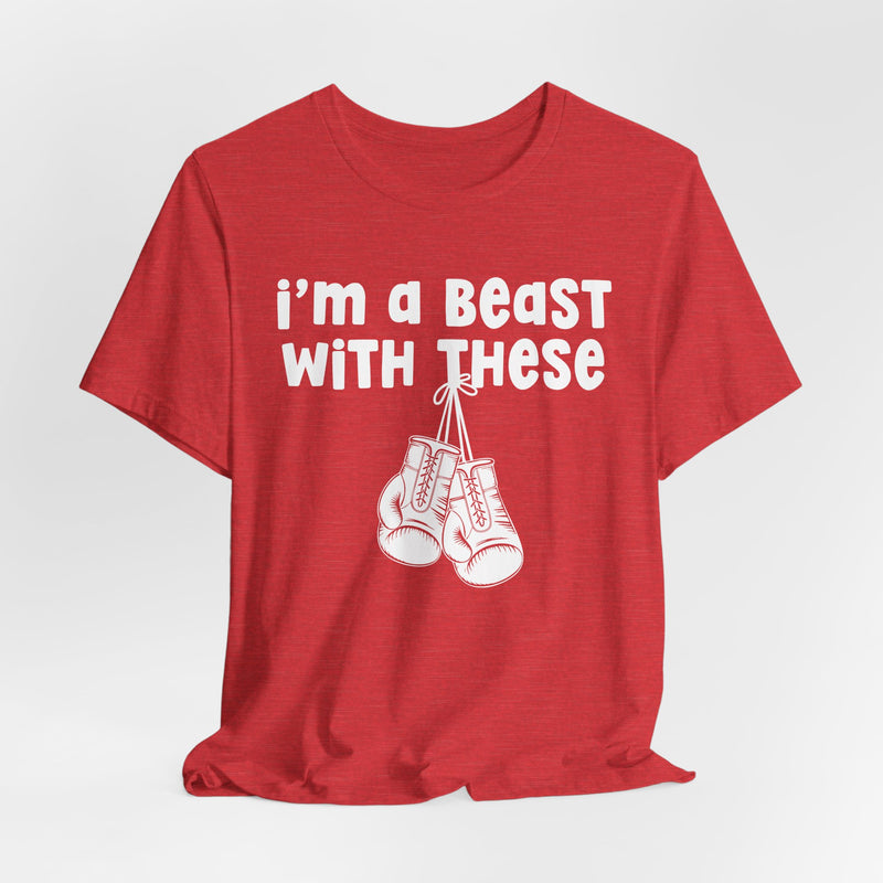Red t-shirt with boxing gloves and white collegiate lettering reading I'M A BEAST WITH THESE, flat-lay view.