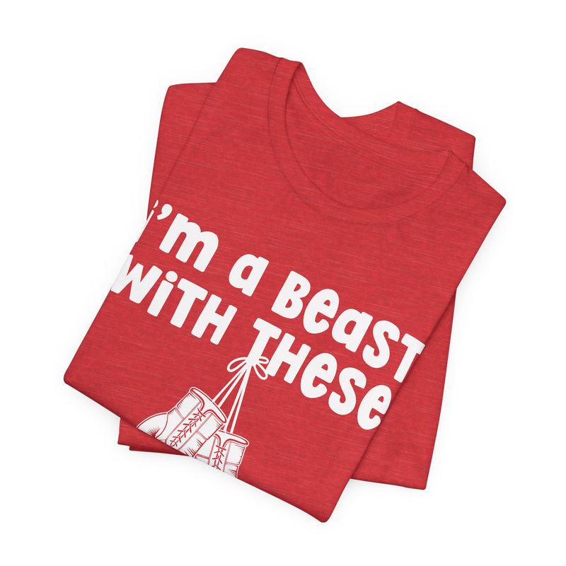 Red t-shirt with boxing gloves and white collegiate lettering reading I'M A BEAST WITH THESE, flat-lay view.