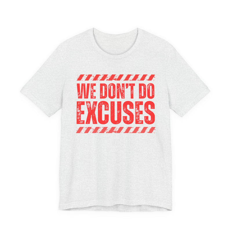White t-shirt with red bubble lettering reading WE DON'T DO EXCUSES, front view.