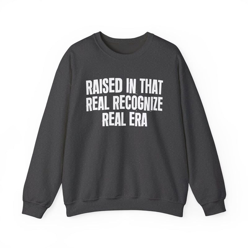 Sweatshirt product with lettering reading "RAISED IN THAT REAL RECOGNIZE REAL ERA", alternate view.