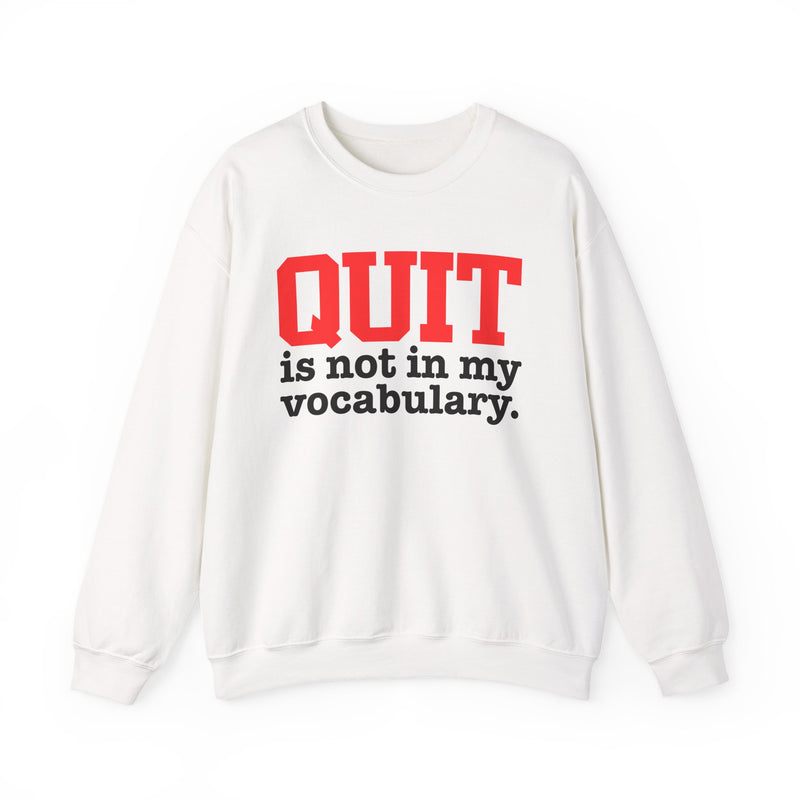 White sweatshirt with black and red block lettering reading "QUIT is not in my vocabulary.", front flat-lay view.