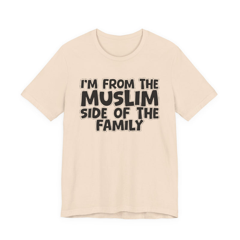 Soft Cream t-shirt, printed with the "I'M FROM THE MUSLIM SIDE OF THE FAMILY" statement in bold outlined bubble lettering, front flat-lay view.