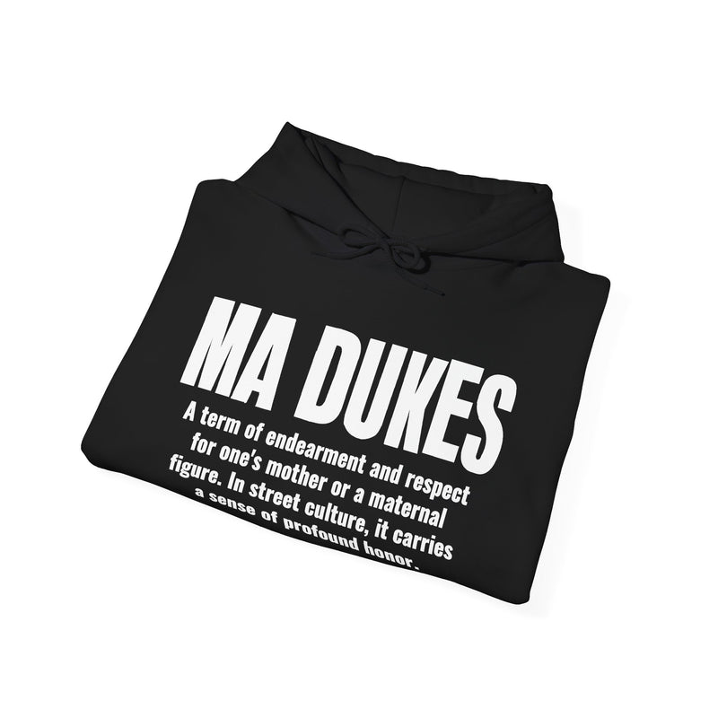 Hoodie in Black with bold lettering reading "MA DUKES" and the dictionary definition honoring one's mother, folded flat lay showing the front design.