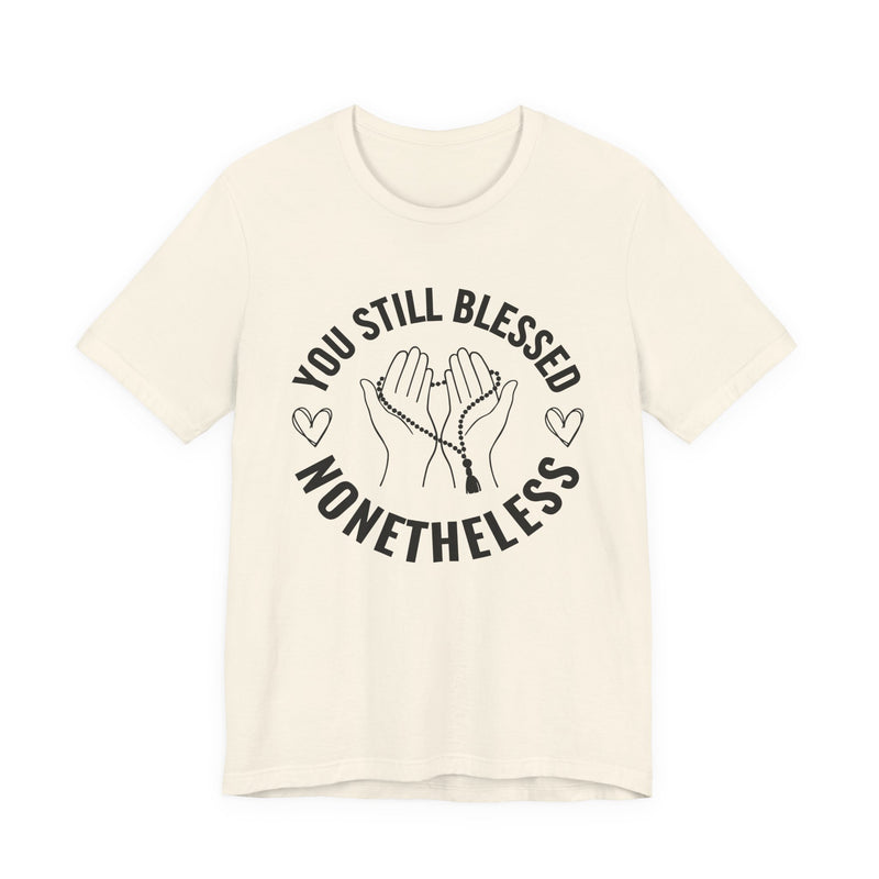 T-Shirt with “YOU STILL BLESSED NONETHELESS” statement print
