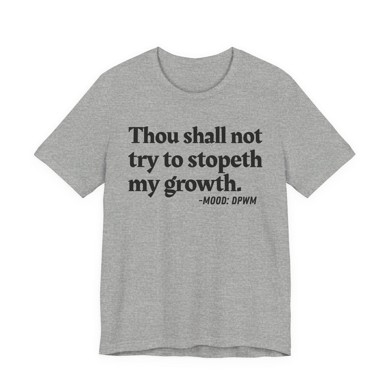 T-Shirt with “THOU SHALL NOT TRY TO STOPETH MY GROWTH” statement print