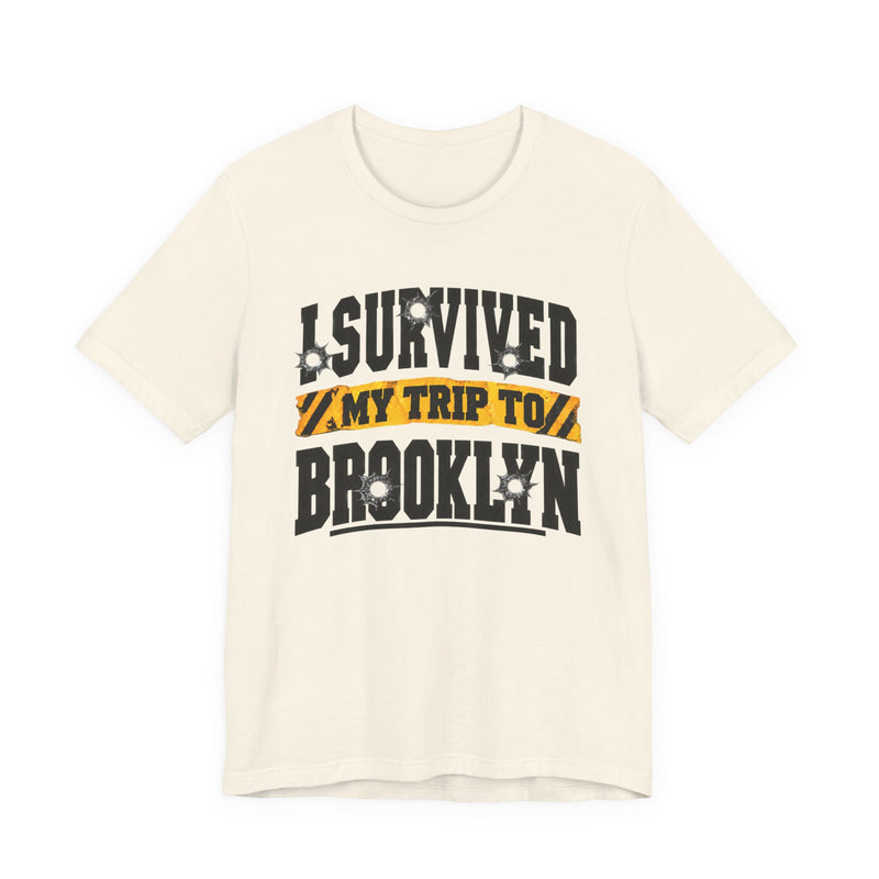 T-Shirt with collegiate lettering reading I SURVIVED MY TRIP TO BROOKLYN, front view.