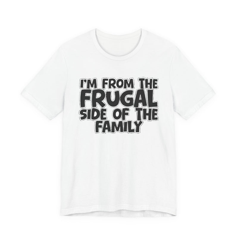 White t-shirt with 'I'M FROM THE FRUGAL SIDE OF THE FAMILY' in black hand-drawn bubble lettering on the chest, front flat-lay mockup view.