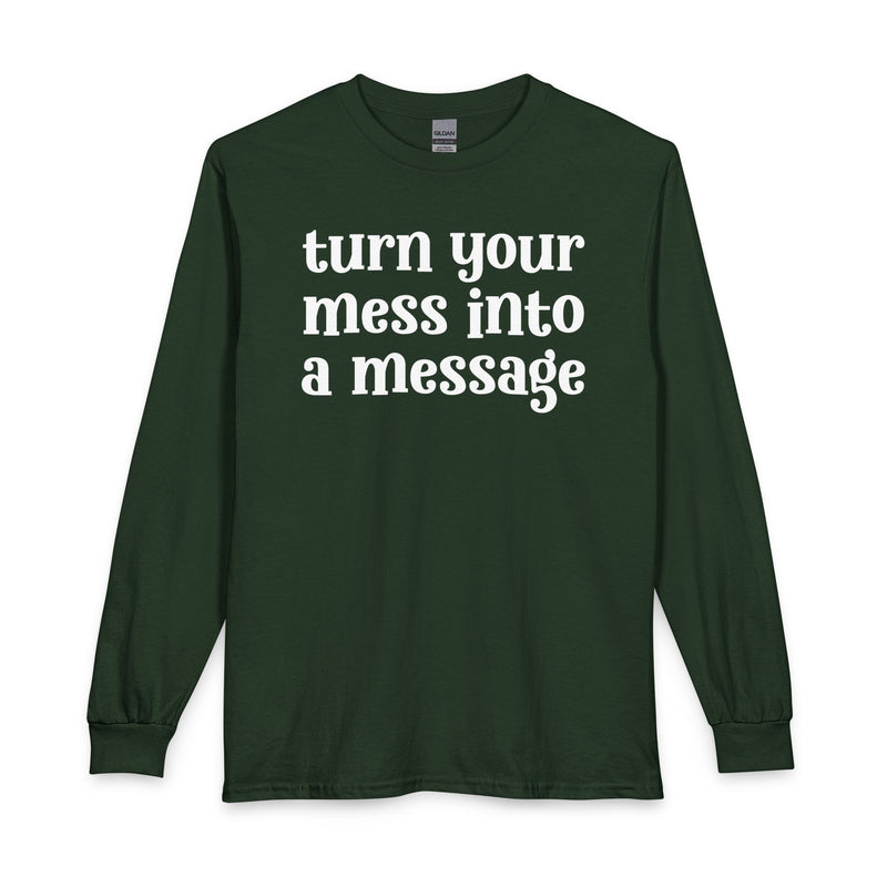 Charcoal long sleeve t-shirt with white lettering reading "turn your mess into a message", front flat-lay view.