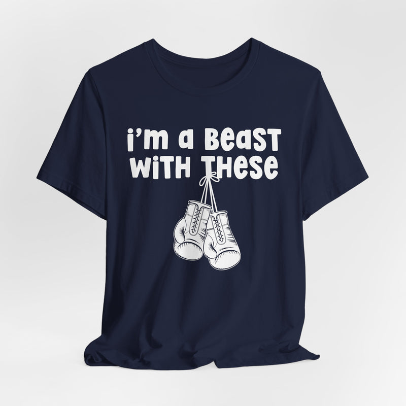 Navy t-shirt with boxing gloves and sand collegiate lettering reading I'M A BEAST WITH THESE, flat-lay view.