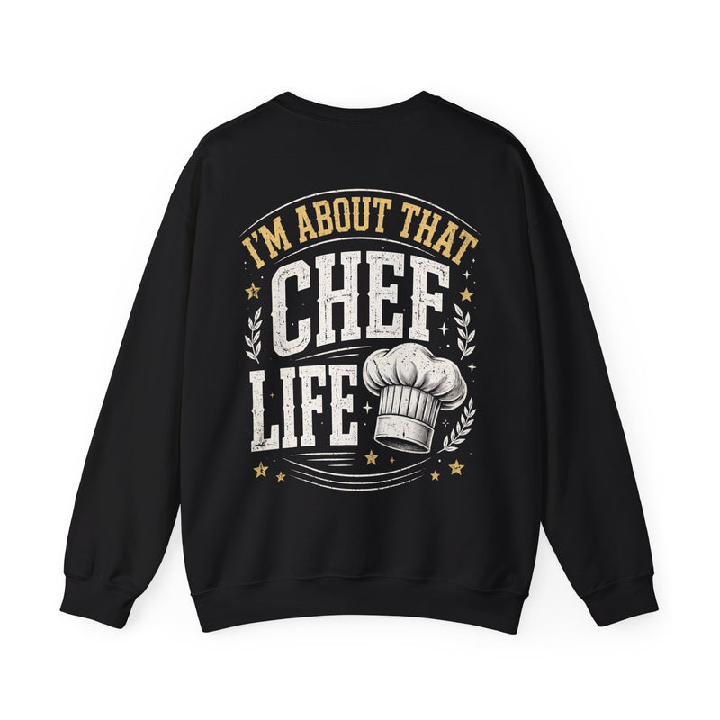 Black sweatshirt with cream bubble lettering reading I'M ABOUT THAT CHEF LIFE, front view.