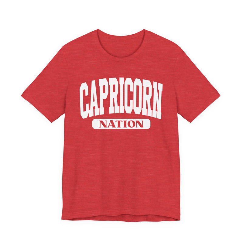 Heather Red t-shirt with white arched CAPRICORN lettering and a NATION pill badge, front view.