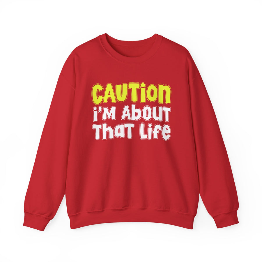 Sweatshirt in Black with lettering reading CAUTION I'M ABOUT THAT LIFE, front view