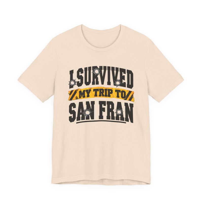 T-shirt with bold lettering reading I SURVIVED MY TRIP TO SAN FRAN, product view.
