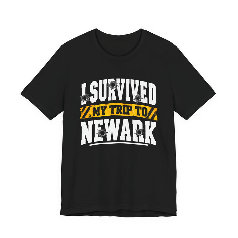 T-Shirt with collegiate lettering reading I SURVIVED MY TRIP TO NEWARK, front view.