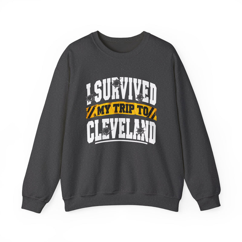 Sweatshirt product with collegiate lettering reading I SURVIVED MY TRIP TO CLEVELAND, lifestyle view.