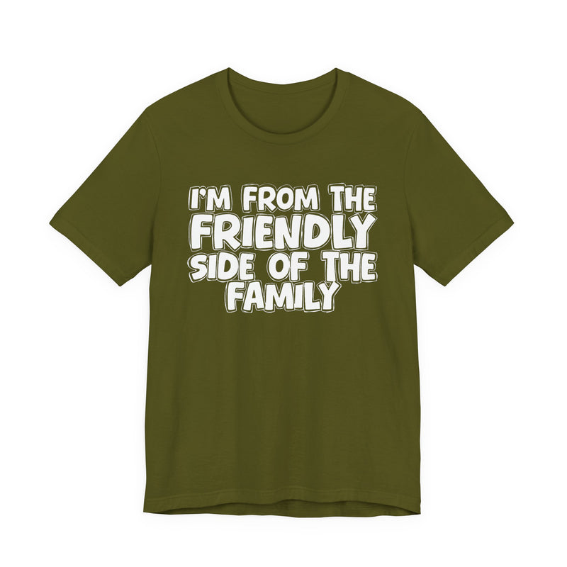 Pink t-shirt with black bubble lettering reading I'M FROM THE FRIENDLY SIDE OF THE FAMILY, front flat-lay view.