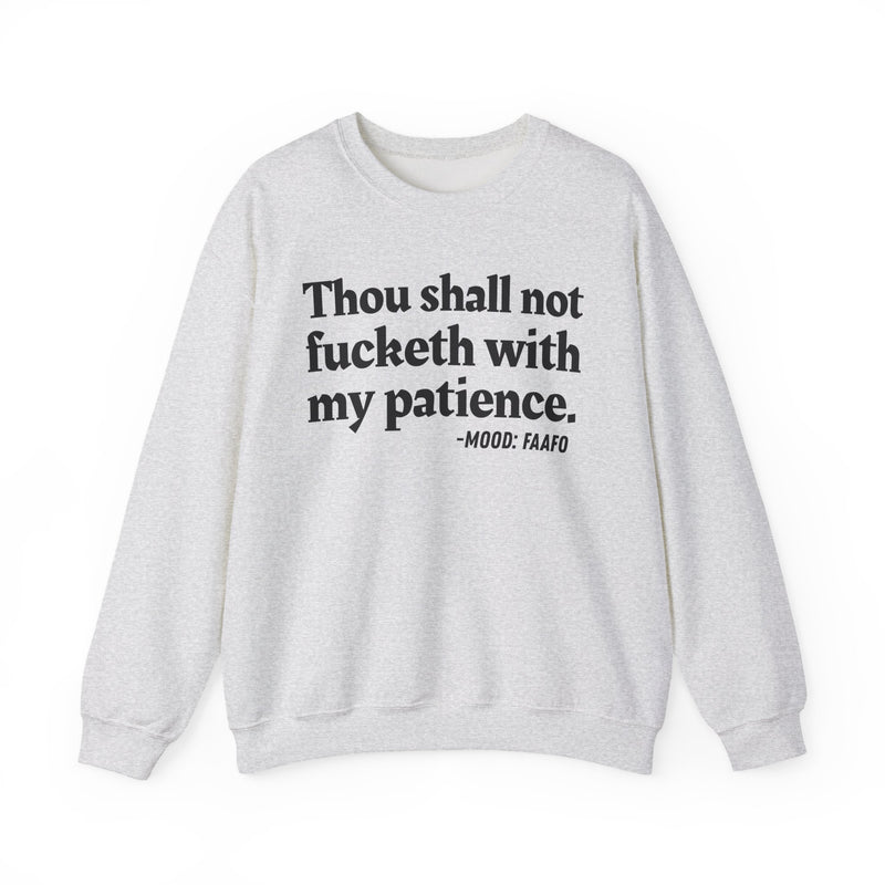 Sweatshirt with “THOU SHALL NOT FUCKETH WITH MY PATIENCE” statement print