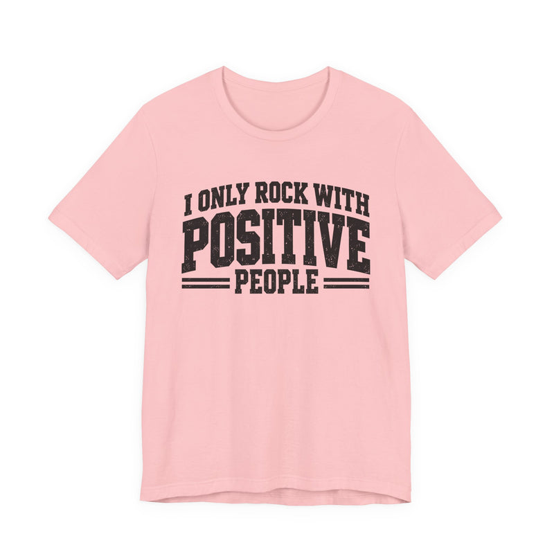 Tee in Pink with lettering reading "I ONLY ROCK WITH POSITIVE PEOPLE", front view.