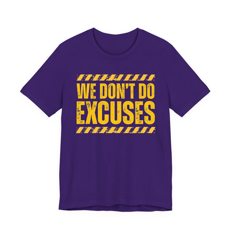 Purple t-shirt with yellow bubble lettering reading WE DON'T DO EXCUSES, front view.