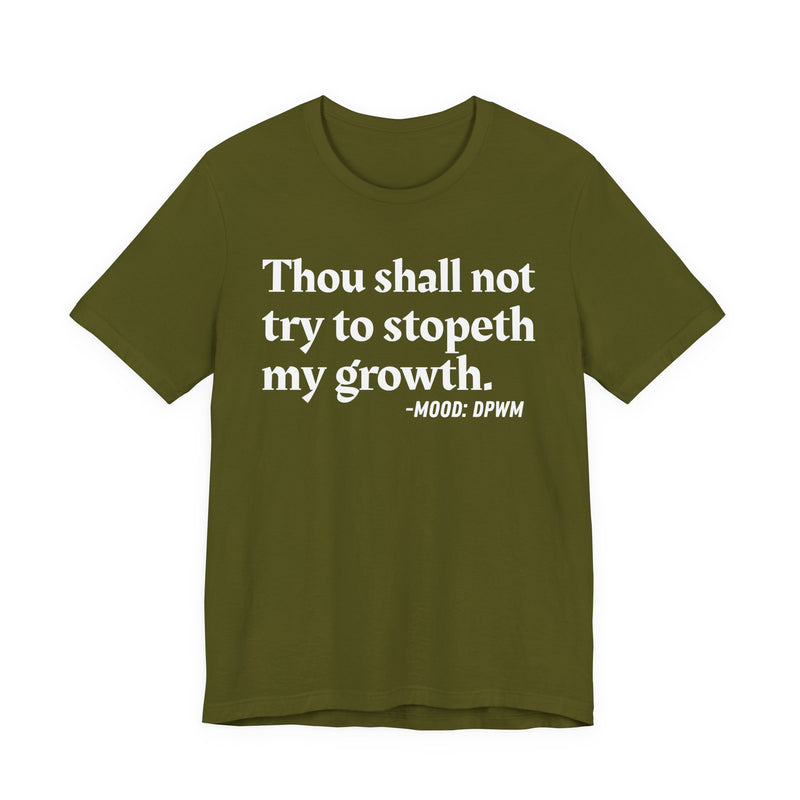 T-Shirt with “THOU SHALL NOT TRY TO STOPETH MY GROWTH” statement print
