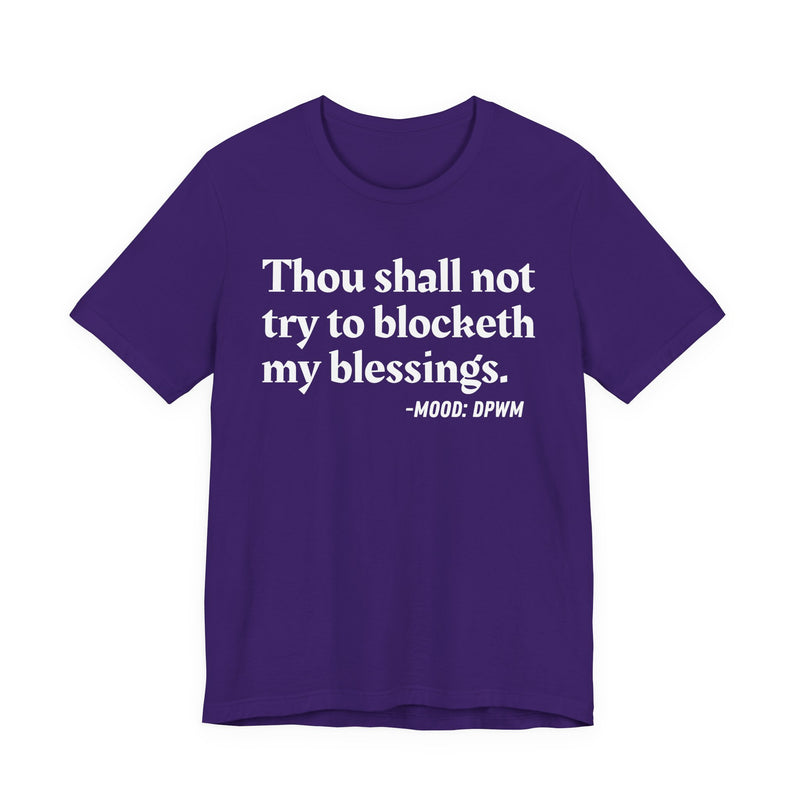 T-Shirt with “THOU SHALL NOT TRY TO BLOCKETH MY BLESSINGS” statement print