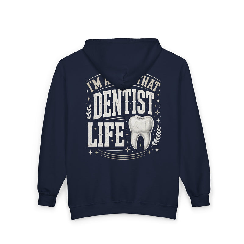Navy zip hoodie with white bubble lettering reading I'M ABOUT THAT DENTIST LIFE, back view.