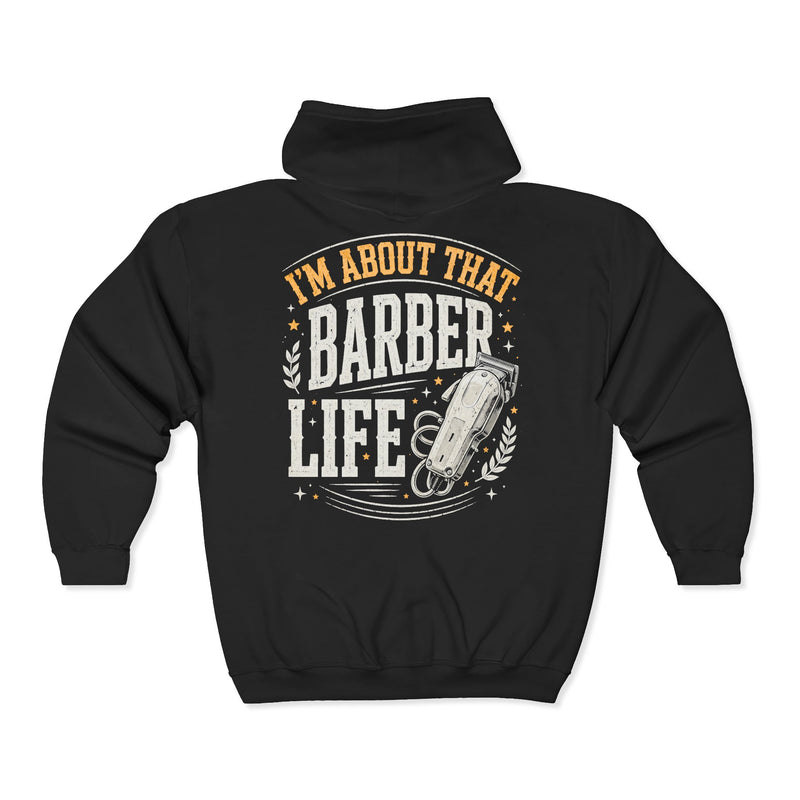 Black zip hoodie with multicolor retro I'M ABOUT THAT BARBER LIFE lettering and clippers graphic, back view.