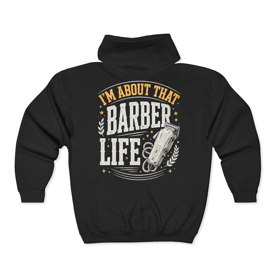 Black zip hoodie with multicolor retro I'M ABOUT THAT BARBER LIFE lettering and clippers graphic, back view.