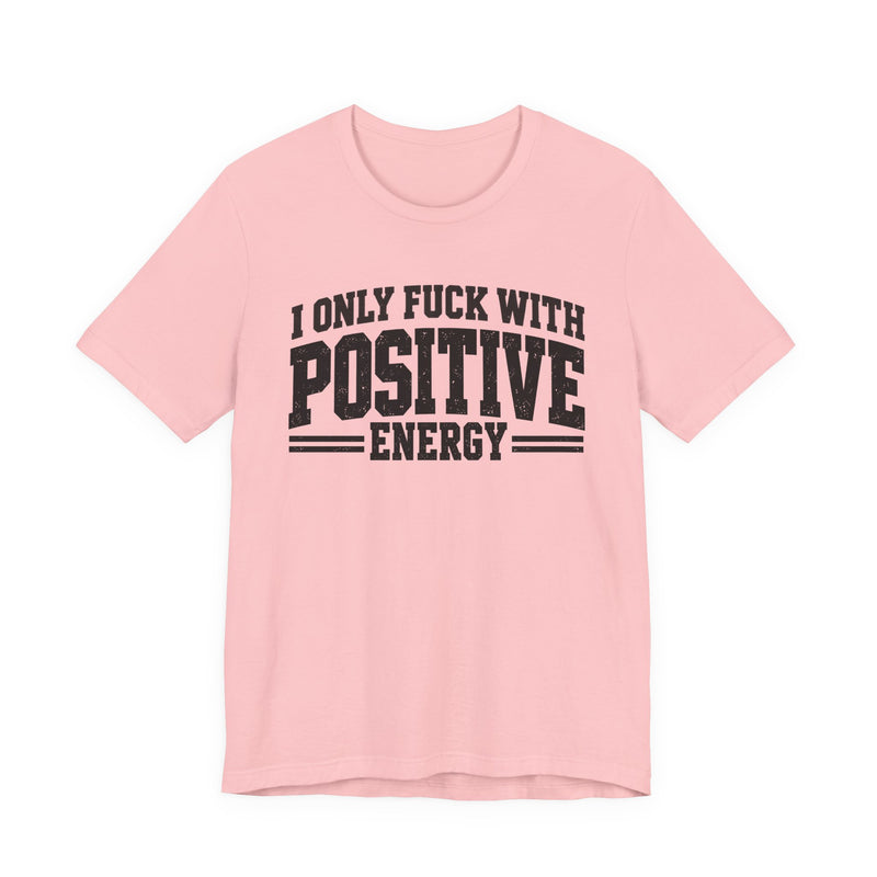 T-Shirt in Pink with lettering reading "I ONLY FUCK WITH POSITIVE ENERGY", front view.