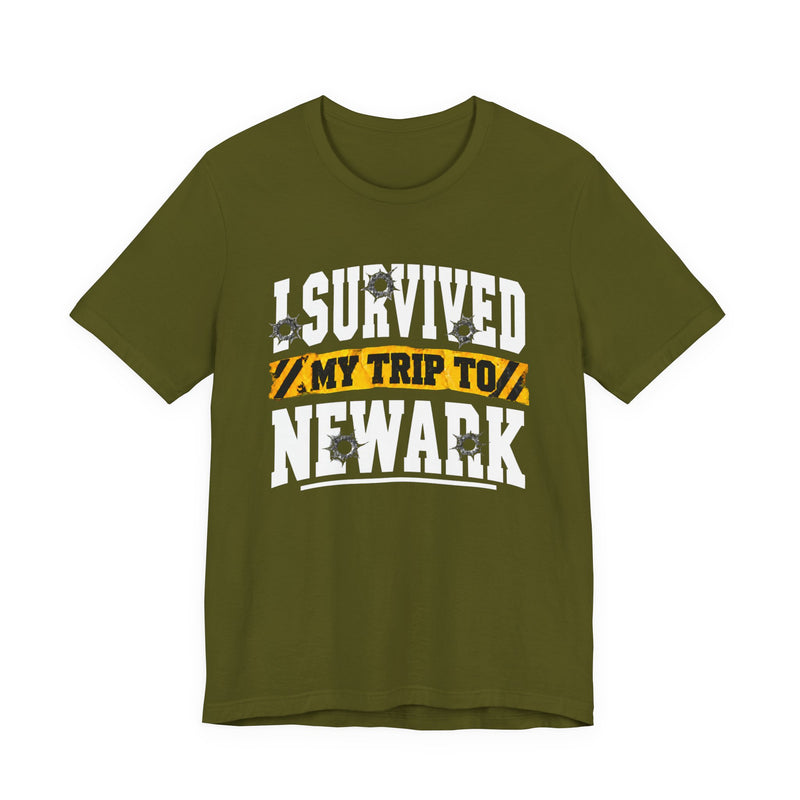 T-Shirt with collegiate lettering reading I SURVIVED MY TRIP TO NEWARK, front view.