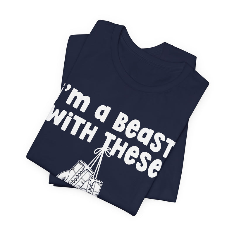 Navy t-shirt with boxing gloves and cream collegiate lettering reading I'M A BEAST WITH THESE, flat-lay view.