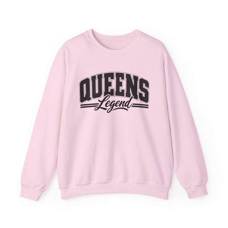 Light pink sweatshirt with black varsity block and script lettering reading QUEENS LEGEND, front flat-lay view.