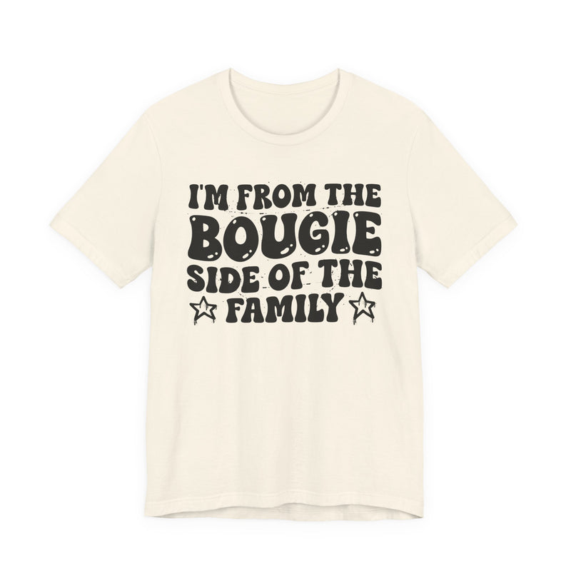 Natural t-shirt with white outlined bubble lettering reading 'I'M FROM THE BOUGIE SIDE OF THE FAMILY', front flat-lay view.
