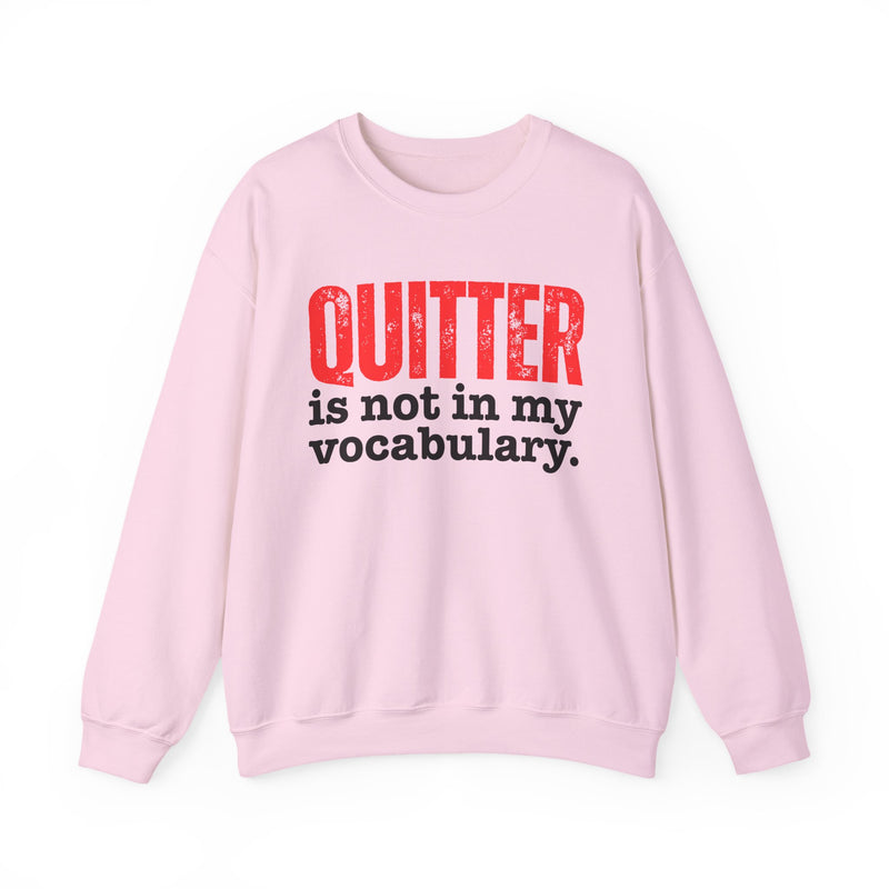 Graphic sweatshirt with bold statement lettering reading "QUITTER IS NOT IN MY VOCABULARY", front view, product mockup