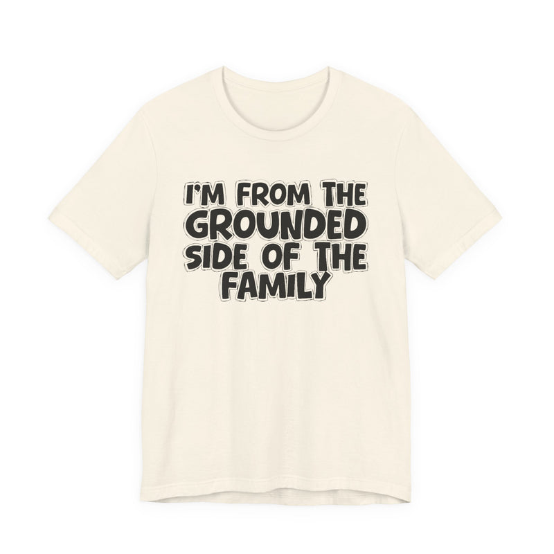 Soft Cream t-shirt with 'I'M FROM THE GROUNDED SIDE OF THE FAMILY' in black hand-drawn bubble lettering on the chest, front flat-lay mockup view.