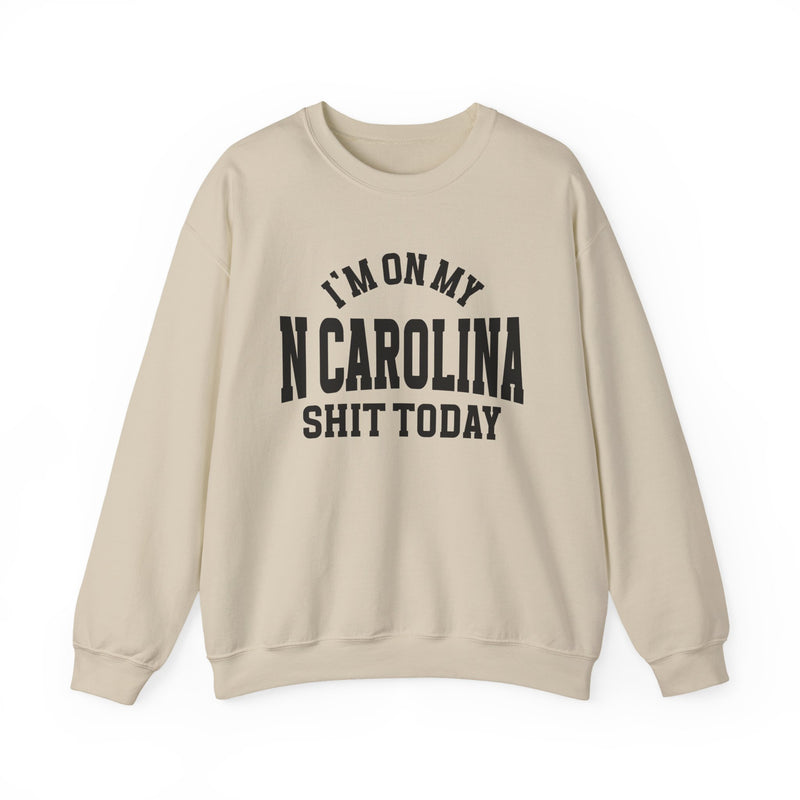 Sweatshirt product photo with arched collegiate lettering reading "I'M ON MY" over large block letters reading "N CAROLINA" with "SHIT TODAY" beneath, front view.